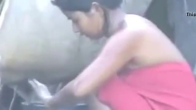 Desi village girl with big tits taking bath in public